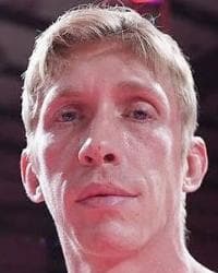 AARON MICK